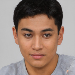 Neutral asian young-adult male with short  brown hair and brown eyes