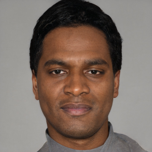 Neutral black young-adult male with short  black hair and brown eyes