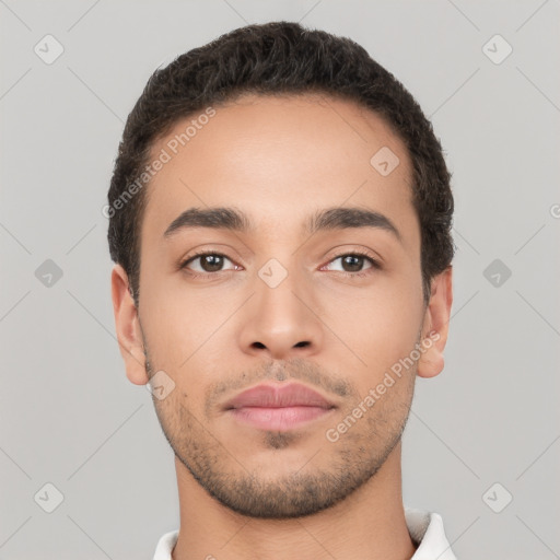 Neutral latino young-adult male with short  black hair and brown eyes