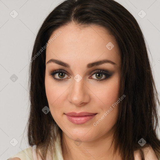 Joyful white young-adult female with long  brown hair and brown eyes