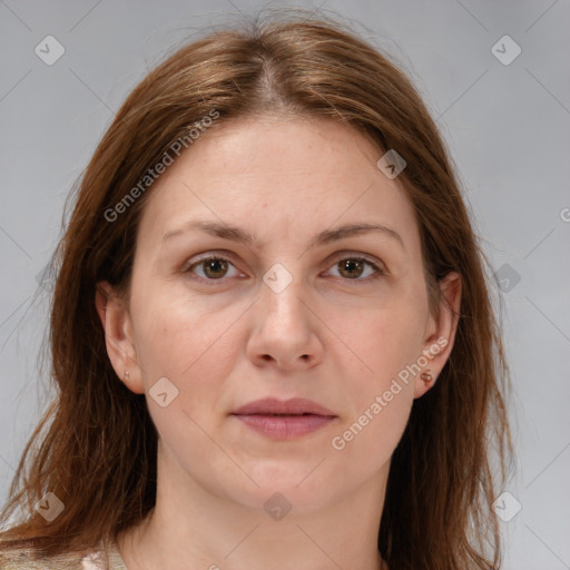 Joyful white adult female with medium  brown hair and brown eyes