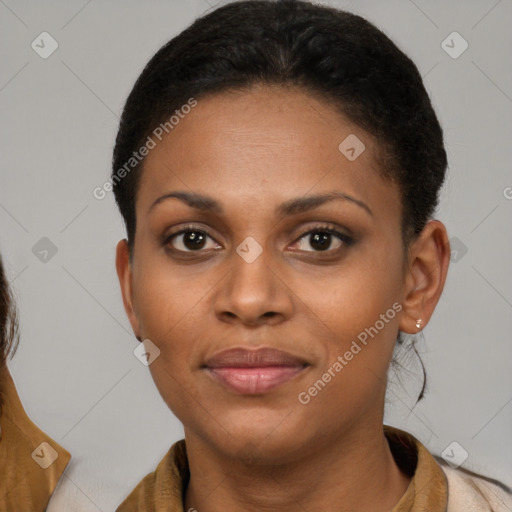 Joyful latino young-adult female with medium  brown hair and brown eyes