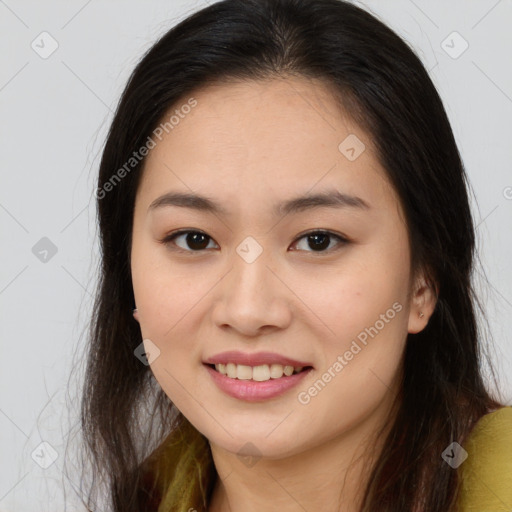 Joyful asian young-adult female with long  brown hair and brown eyes