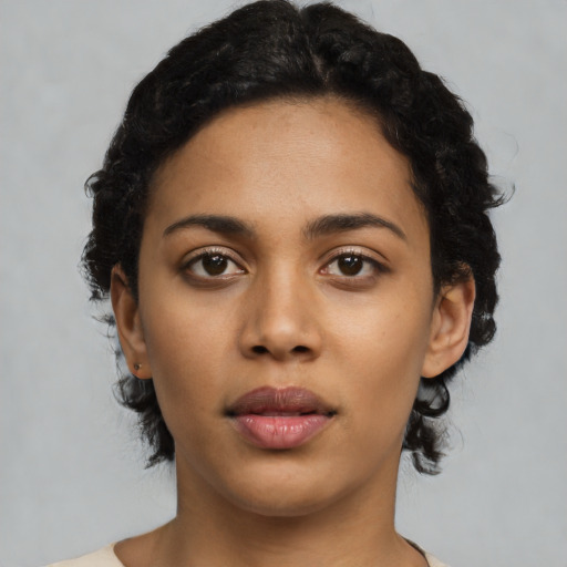Neutral latino young-adult female with short  black hair and brown eyes