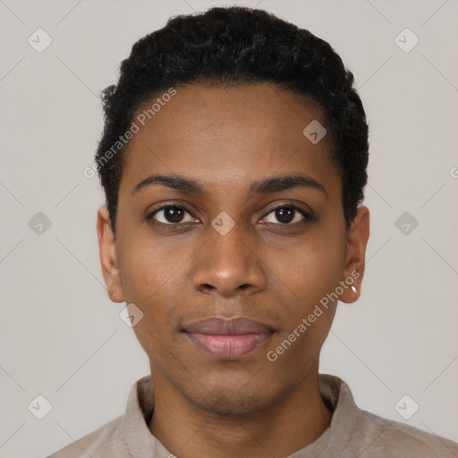 Joyful black young-adult female with short  black hair and brown eyes