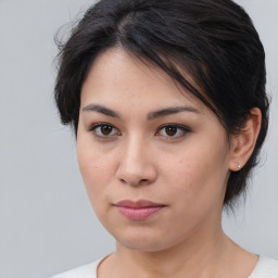 Neutral asian young-adult female with medium  brown hair and brown eyes