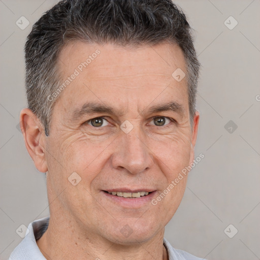 Joyful white adult male with short  brown hair and brown eyes