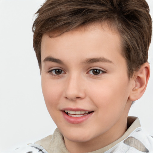 Joyful white child male with short  brown hair and brown eyes