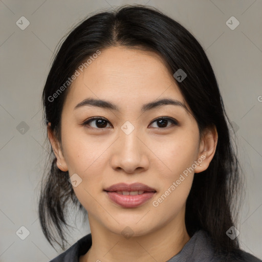 Joyful asian young-adult female with medium  black hair and brown eyes