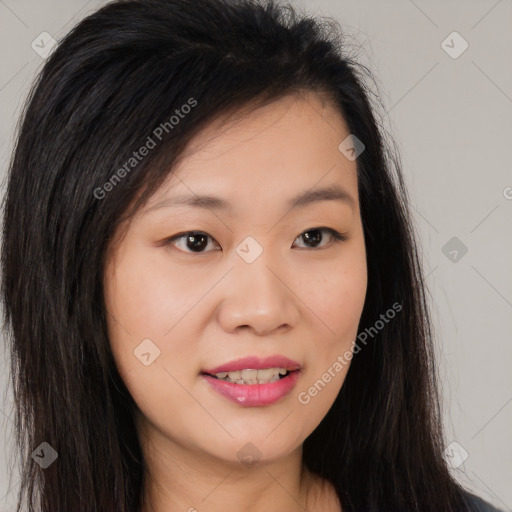 Joyful asian young-adult female with long  brown hair and brown eyes