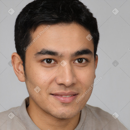 Joyful latino young-adult male with short  brown hair and brown eyes