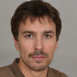 Neutral white adult male with short  brown hair and brown eyes