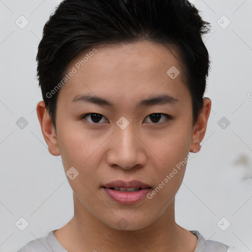Joyful asian young-adult female with short  brown hair and brown eyes
