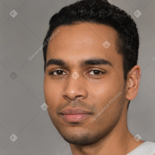 Neutral latino young-adult male with short  black hair and brown eyes