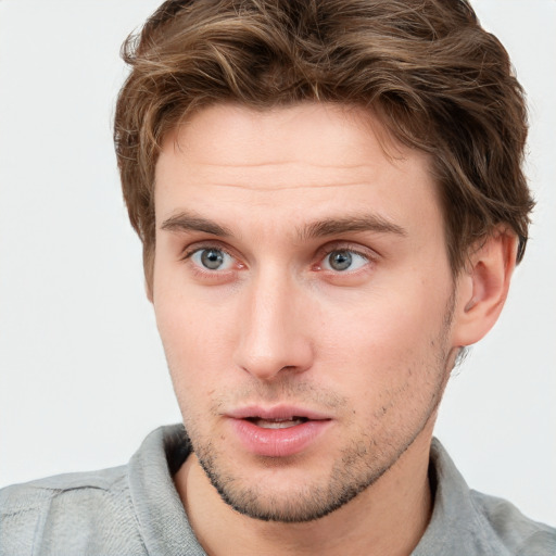 Neutral white young-adult male with short  brown hair and grey eyes