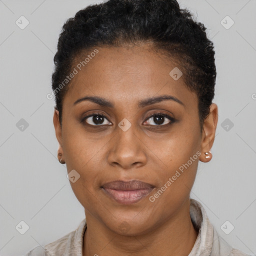 Joyful black young-adult female with short  brown hair and brown eyes