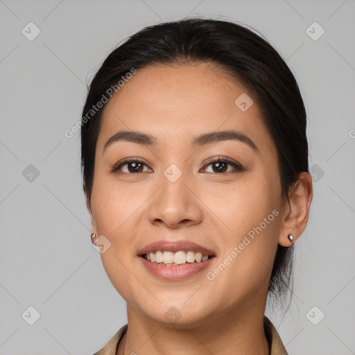 Joyful white young-adult female with medium  brown hair and brown eyes