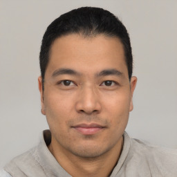 Neutral asian young-adult male with short  black hair and brown eyes