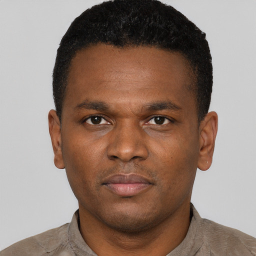 Neutral black young-adult male with short  brown hair and brown eyes