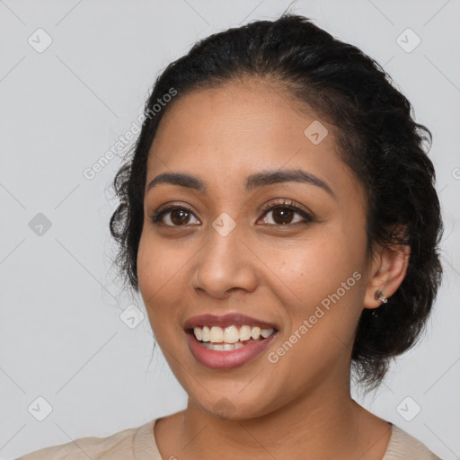 Joyful latino young-adult female with medium  black hair and brown eyes