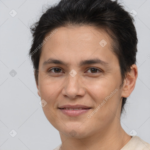 Joyful white adult female with short  brown hair and brown eyes