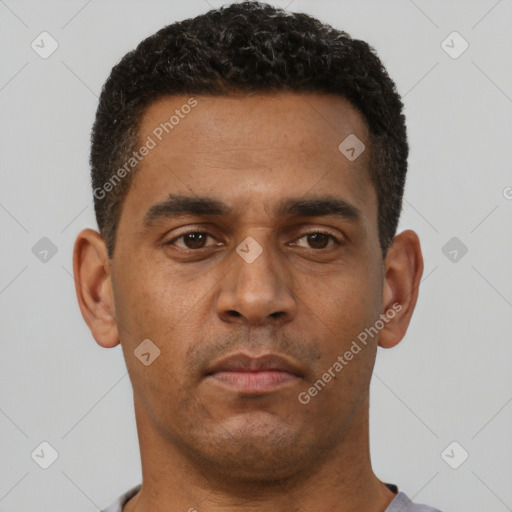 Neutral latino young-adult male with short  brown hair and brown eyes