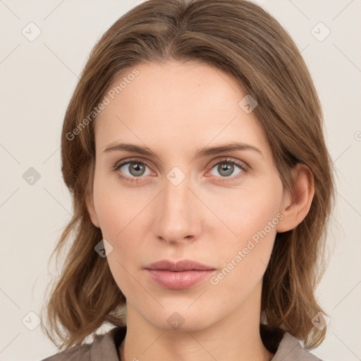 Neutral white young-adult female with medium  brown hair and grey eyes