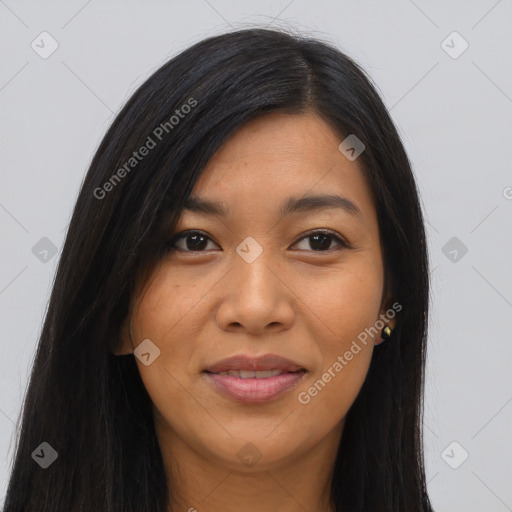 Joyful asian young-adult female with long  black hair and brown eyes