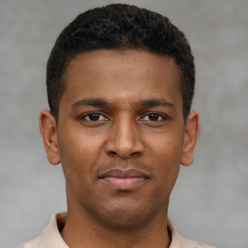 Neutral latino young-adult male with short  brown hair and brown eyes