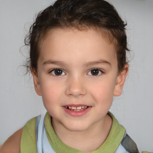 Joyful white child female with short  brown hair and brown eyes