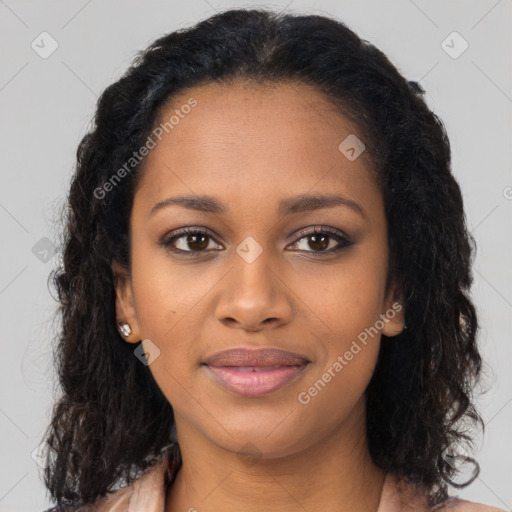 Joyful black young-adult female with long  brown hair and brown eyes