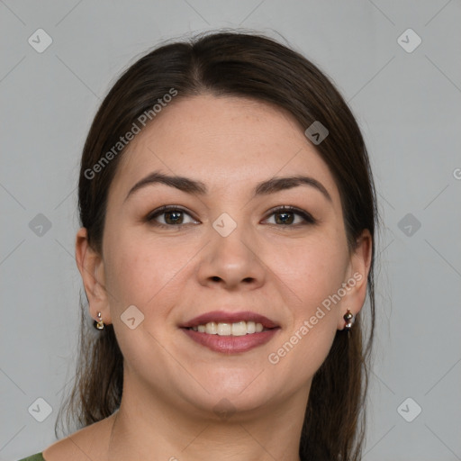 Joyful white young-adult female with medium  brown hair and grey eyes