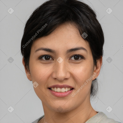 Joyful asian young-adult female with short  black hair and brown eyes