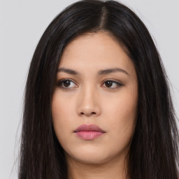 Neutral asian young-adult female with long  brown hair and brown eyes