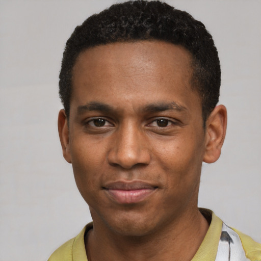 Neutral black young-adult male with short  black hair and brown eyes