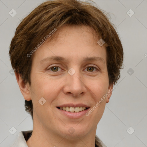 Joyful white adult female with short  brown hair and grey eyes