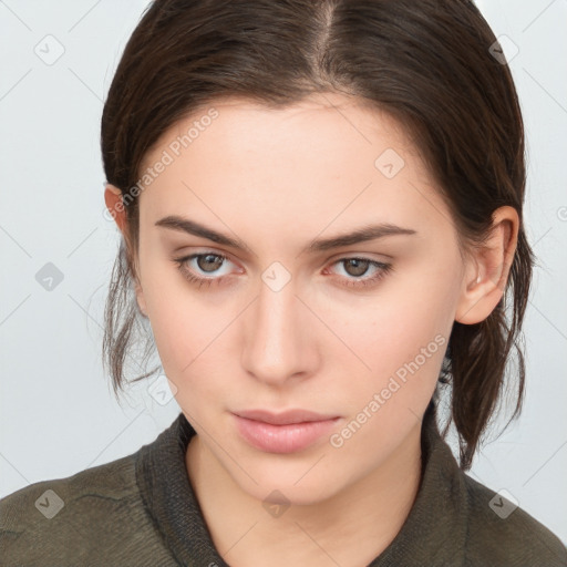 Neutral white young-adult female with medium  brown hair and brown eyes