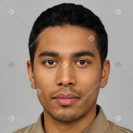 Neutral latino young-adult male with short  black hair and brown eyes