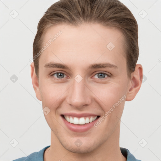 Joyful white young-adult female with short  brown hair and grey eyes