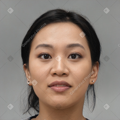 Joyful asian young-adult female with medium  black hair and brown eyes