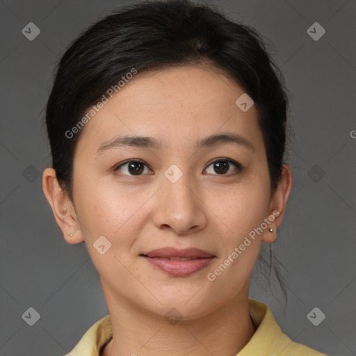 Joyful latino young-adult female with short  brown hair and brown eyes