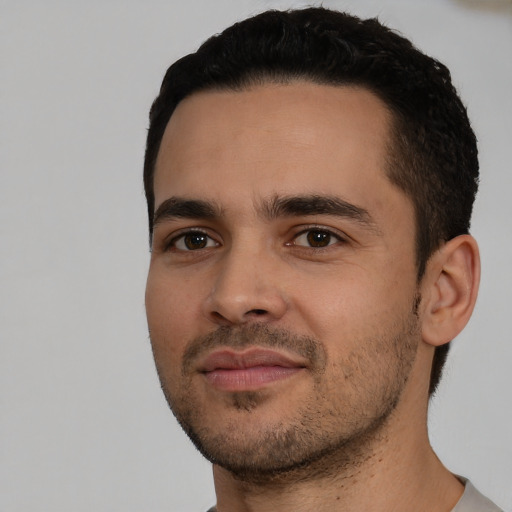 Neutral white young-adult male with short  black hair and brown eyes