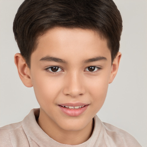 Joyful white child male with short  brown hair and brown eyes