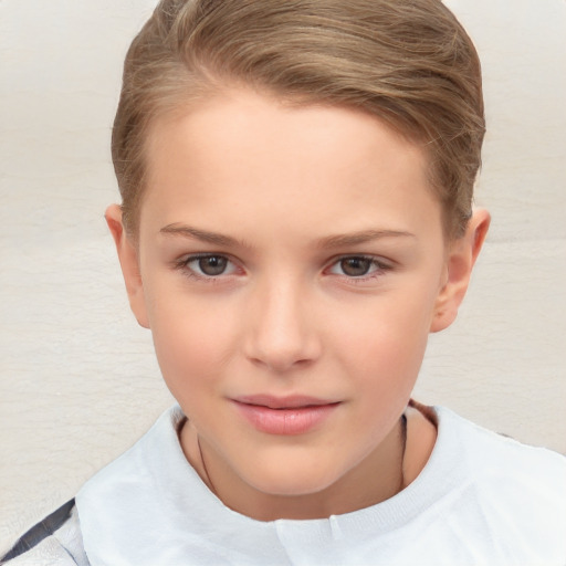 Joyful white child female with short  brown hair and brown eyes