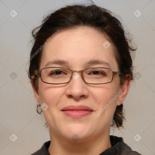 Joyful white adult female with medium  brown hair and brown eyes