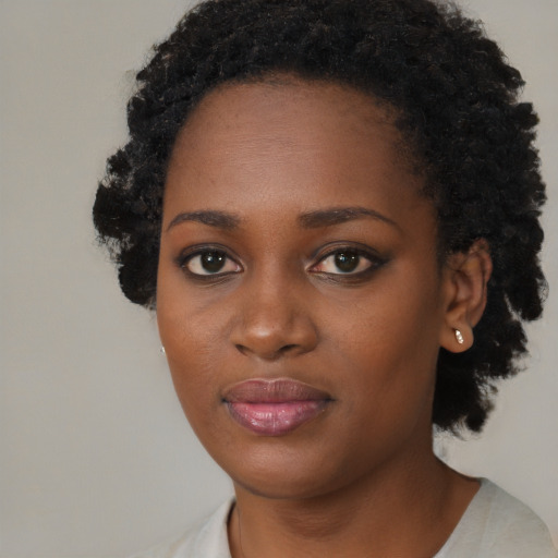 Neutral black young-adult female with short  black hair and brown eyes