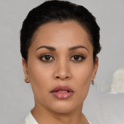 Neutral latino young-adult female with short  brown hair and brown eyes