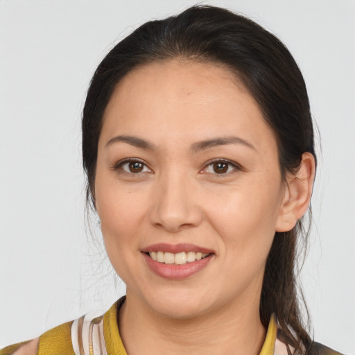 Joyful white young-adult female with medium  brown hair and brown eyes