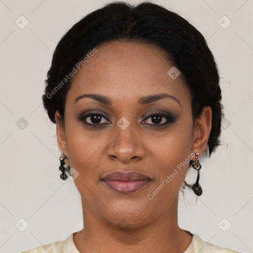 Joyful black young-adult female with short  black hair and brown eyes