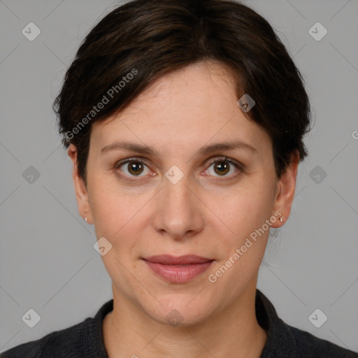 Joyful white adult female with short  brown hair and brown eyes